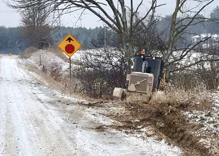 grader forced off road in puslinch