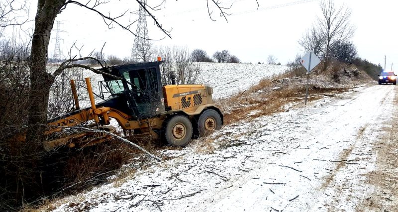 grader forced off road in puslinch